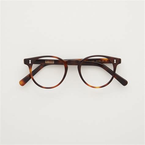 Herbrand: Classic panto acetate glasses .